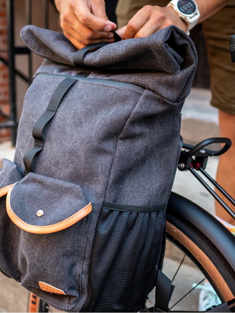 Classic Gray Roll-Top Backpack with Tan Trim
